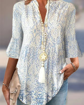 Topp med 3/4-ärmar och blommigt tryck