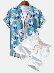Tropisk blommig skjorta med knapp upp och badshorts
