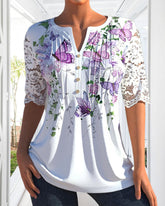 Elegant topp med fjäriltryckt