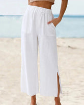 Avslappnad enfärgad slitsbyxor med ficka