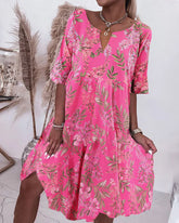 Skiftklänning med blommönster