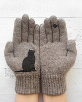 Bomullshandskar med en katt