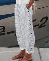 Randiga träningsbyxor med knappficka