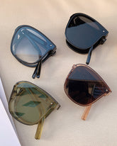 Vikbara solglasögon