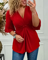 Klockärm enfärgad V-ringad topp