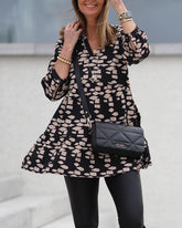 Topp med långa ärmar och tryck