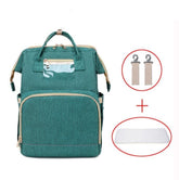 Hopfällbar ryggsäck för spjälsäng