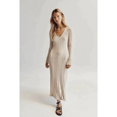 Långärmad stickad klänning