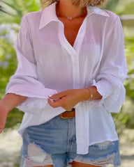 Enfärgad blus med långa ärmar