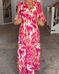 V-ringad modetryck klänning med 3/4 ärm