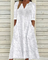 Trendig spetsklänning med fickor