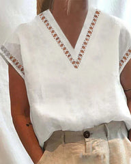 Skjorta med v-ringad spets krage