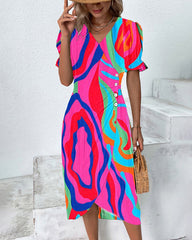 Färgglad midjeklänning