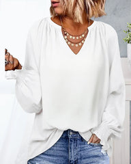 V-ringad Blus