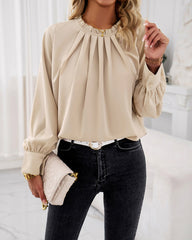 Elegant blus med volanger