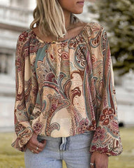 Boho blus med tryckt och lykta ärm