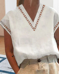 Skjorta med v-ringad spets krage