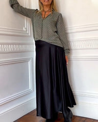 V-ringad ledig blus med geometriskt tryck