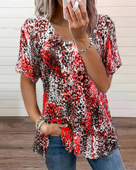 Rynkad v-ringad topp i leopardmönster och korta armar