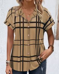 V-ringad blus med rutigt tryck