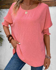 Enfärgad halvärm blus