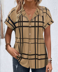 V-ringad blus med rutigt tryck