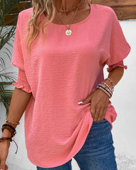 Enfärgad halvärm blus