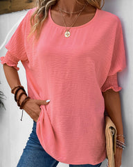 Enfärgad halvärm blus