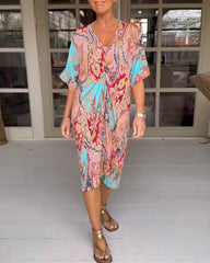 Halvärmsklänning med v-ringning