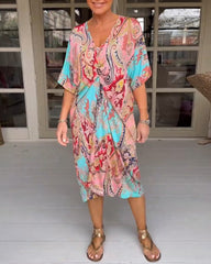 Halvärmsklänning med v-ringning