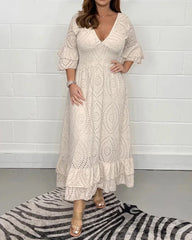 Lös v-ringad enfärgad klänning med hög midja