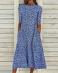 Blommig klänning med fickor