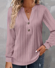 Enfärgad långärmad topp med v-ringad knapp