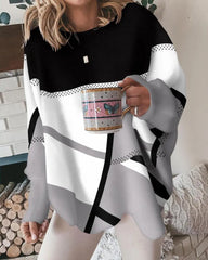 Avslappnad långärmad topp med kontrastfärg