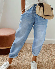 Avslappnad jeans med fickor