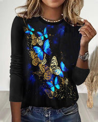 Topp med rund hals och fjärilstryck