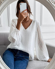 Enfärgad blus med V-ringad