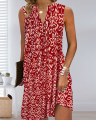 Ärmlös klänning med V-ringning och tryck