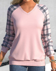 Rutig topp med långa ärmar och V-ringning