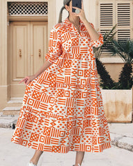 Lapelklänning i geometriskt tryck