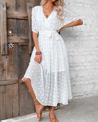 V-ringad elegant enfärgad klänning