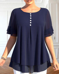 Kortärmad blus med rund hals
