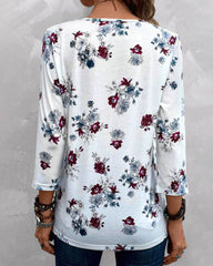 Blommig elegant blus med knappar