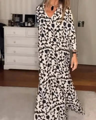 Långärmad lös klänning med V-ringning