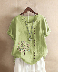 T-shirt med rund hals och bladtryck