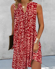 Ärmlös klänning med V-ringning och tryck