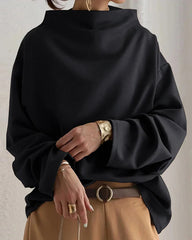 Blus med lös passform och långa ärmar