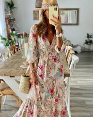 Blommönstrad V-ringad Maxiklänning