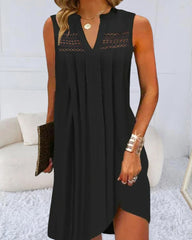 V-ringad ärmlös spetsklänning