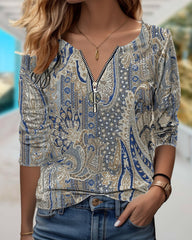 Avslappnad långärmad topp med dragkedja